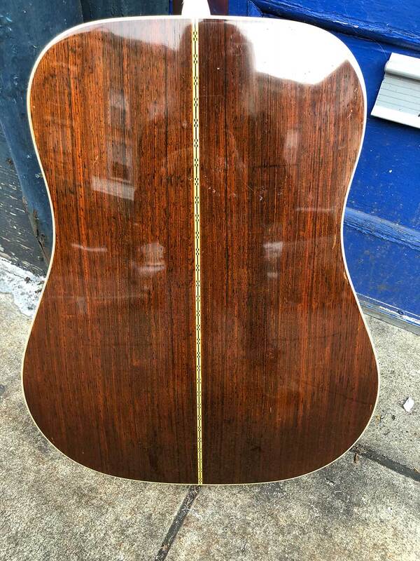 close up photo of the back of a 1962 Martin D28E guitar